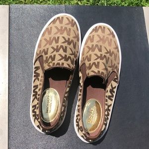 - Michael kors slip on’s.